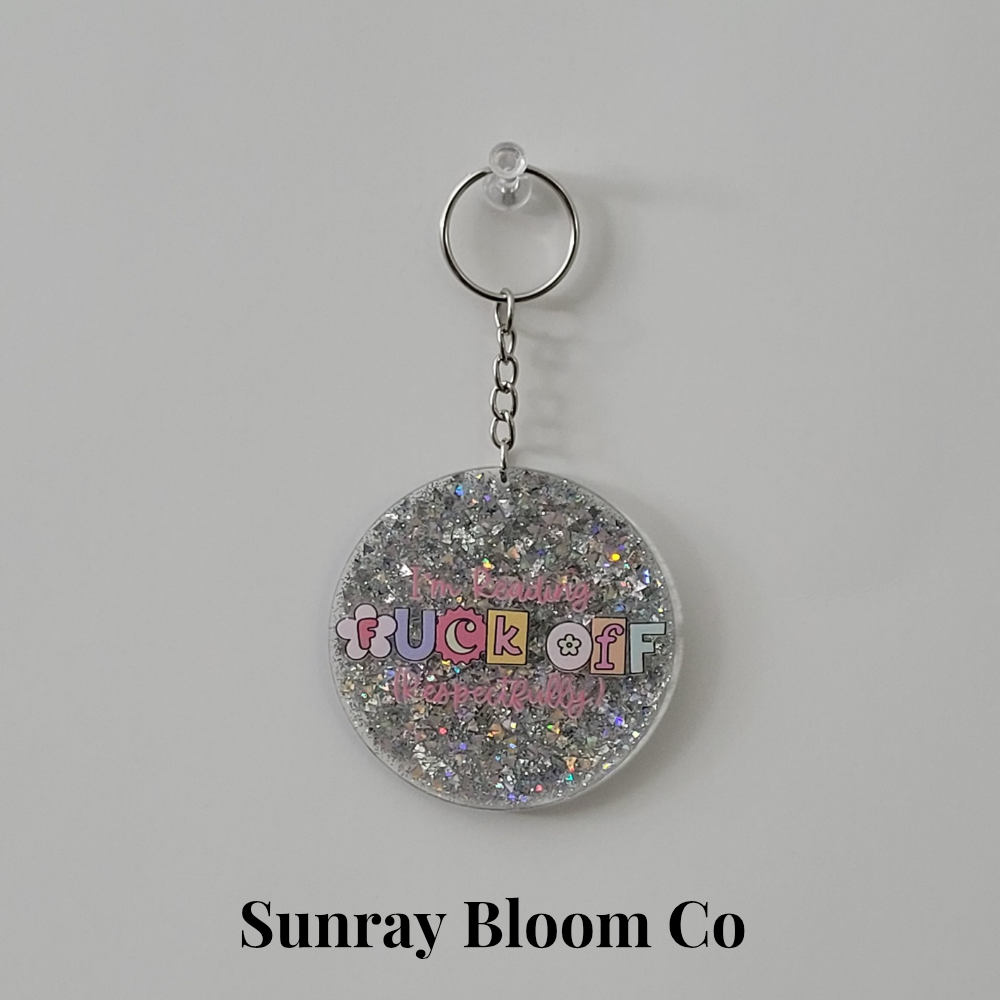 I'm Reading Fuck Off Respectfully Round Acrylic Glitter Keychain