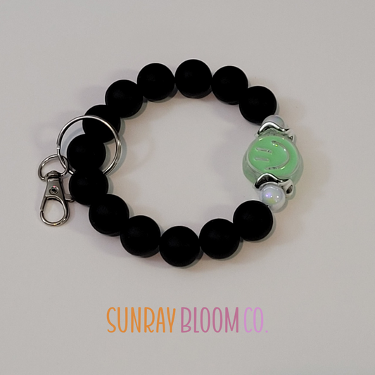 Green Smiley Wristlet
