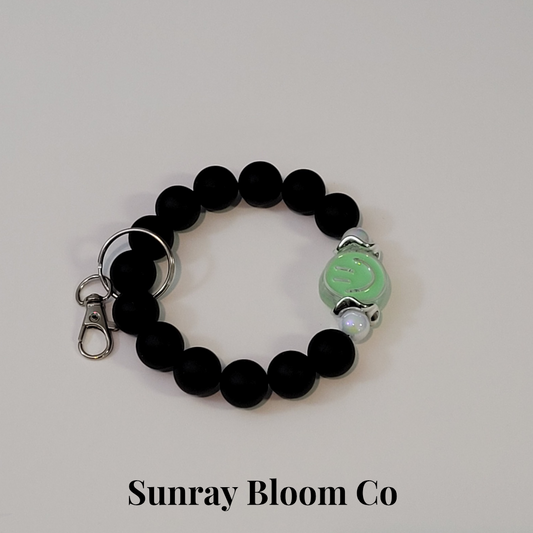 Green Smiley Wristlet