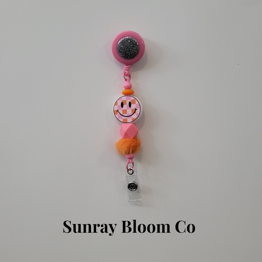 Checkered Smiley Face Beaded Badge